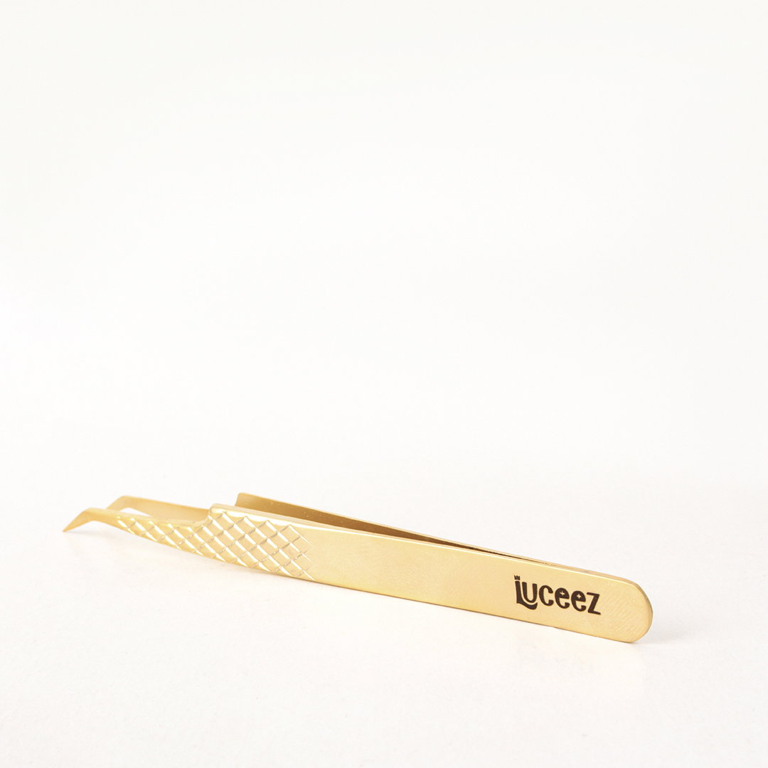 LU 31 GOLD CURVED TWEEZERS _1