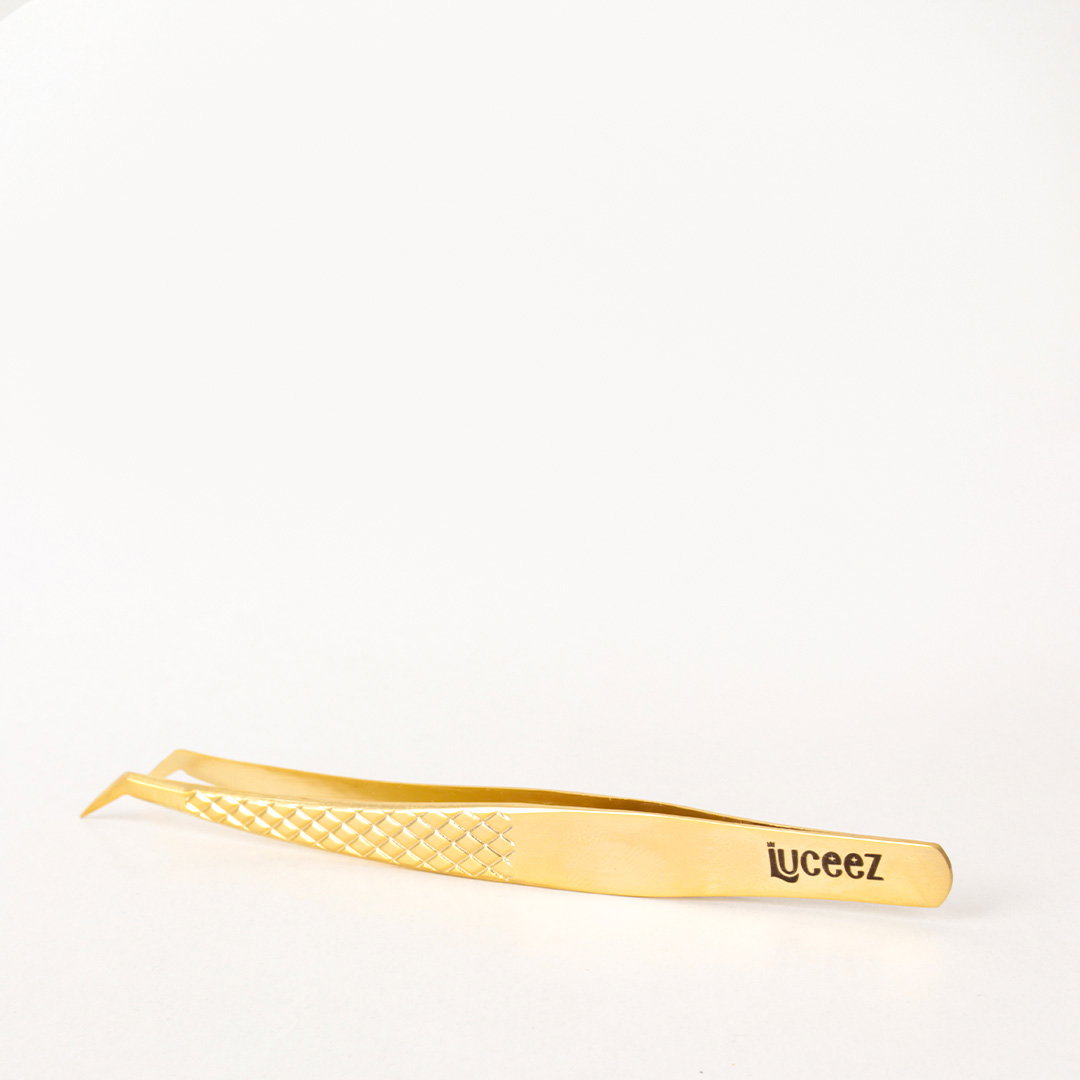 LU 32 GOLD CURVED TWEEZERS