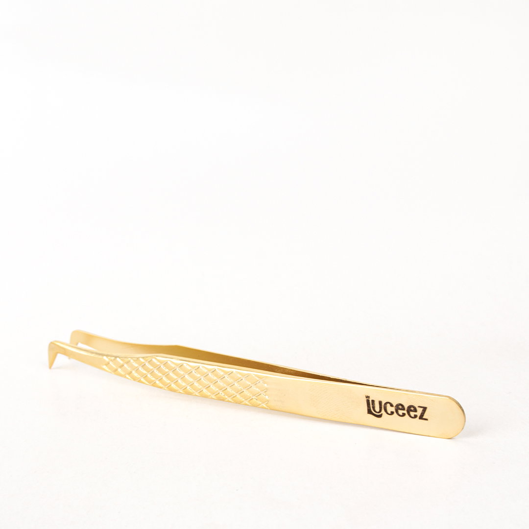 LU 35 GOLD CURVED TWEEZERS _1