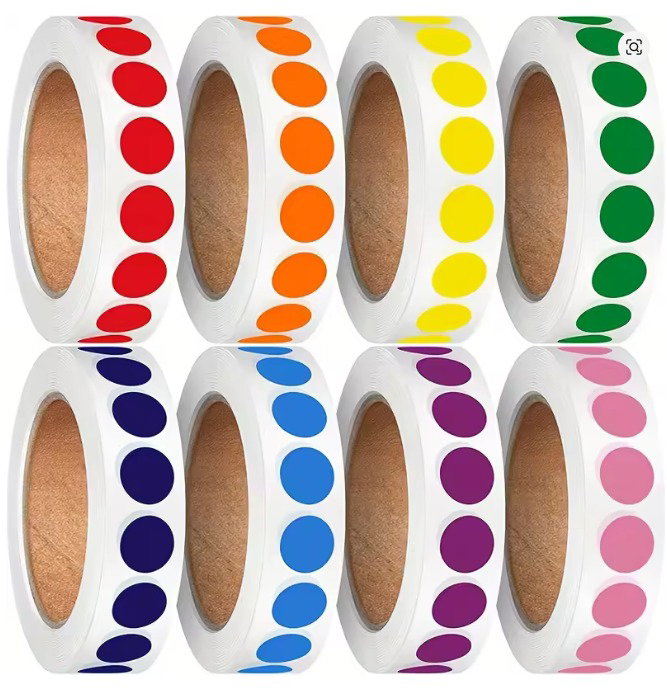 Sticker de puntos de colores.