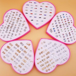36 pair of random pink heart earrings 