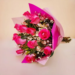 Ramo de 12 rosas rosa con follaje y doble papel