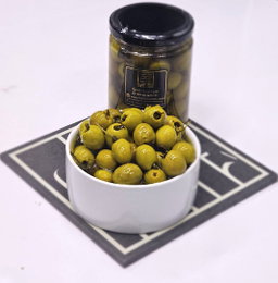 Green Olives Stuffed Thyme Without Salt Dipped In Olive Oil