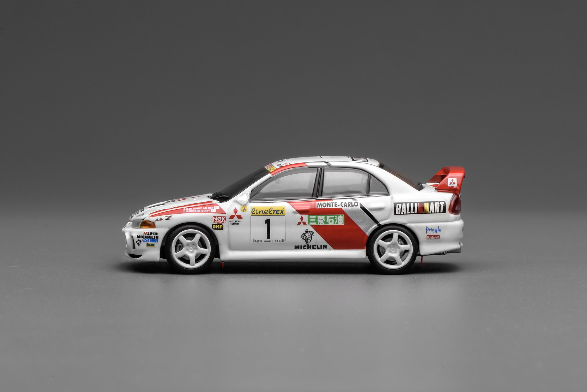MOTOR HELIX MODEL 1/64 MITSUBISHI LANCER EVO 4 GSR - MONTE CARLO_1