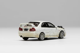 MOTOR HELIX MODEL 1/64 MITSUBISHI LANCER EVO 4 - MUDDY VERSION WITH RALLY LIGHT