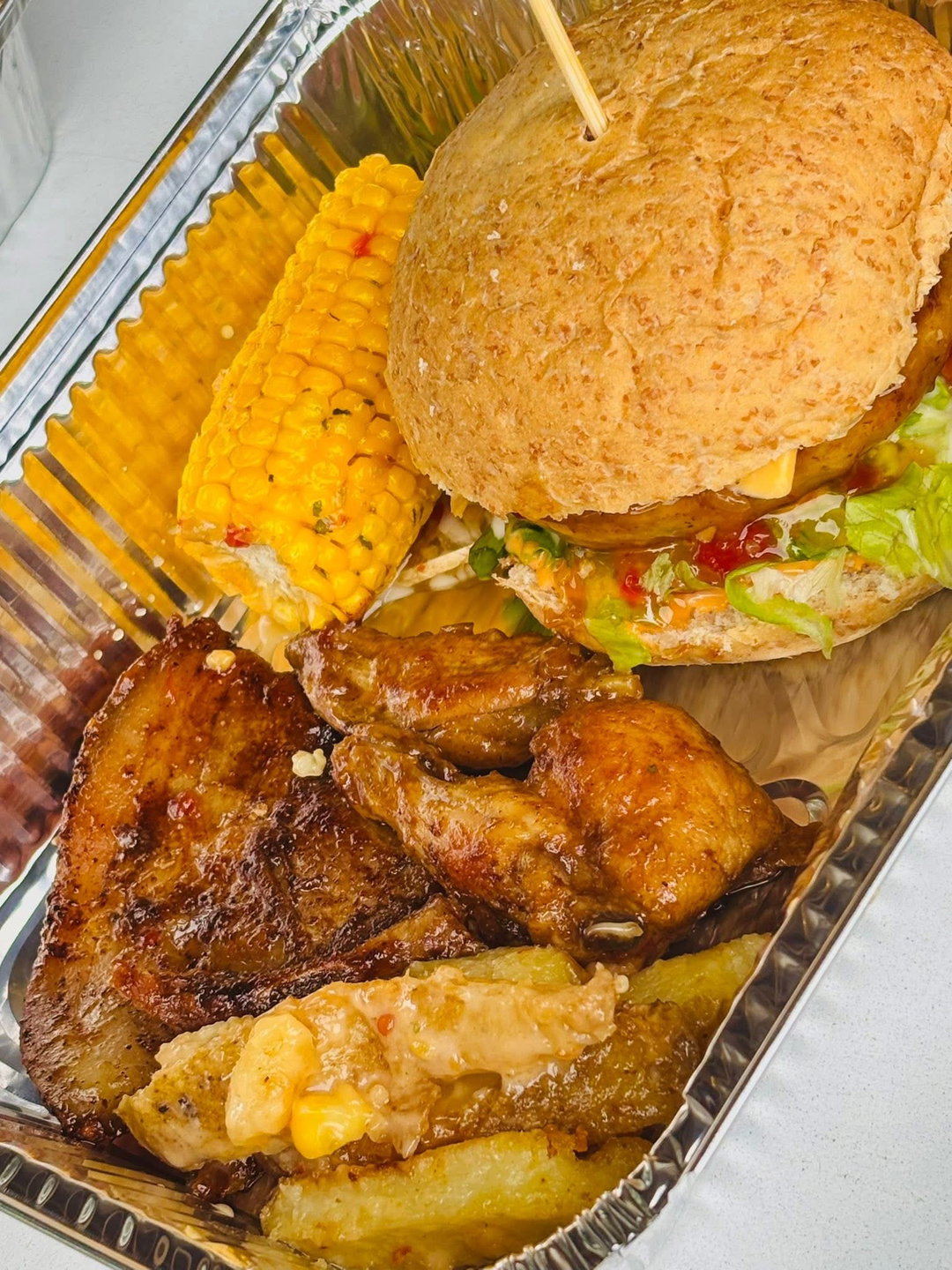 Burger, 2wings, 1steak, fries, sweetcorn