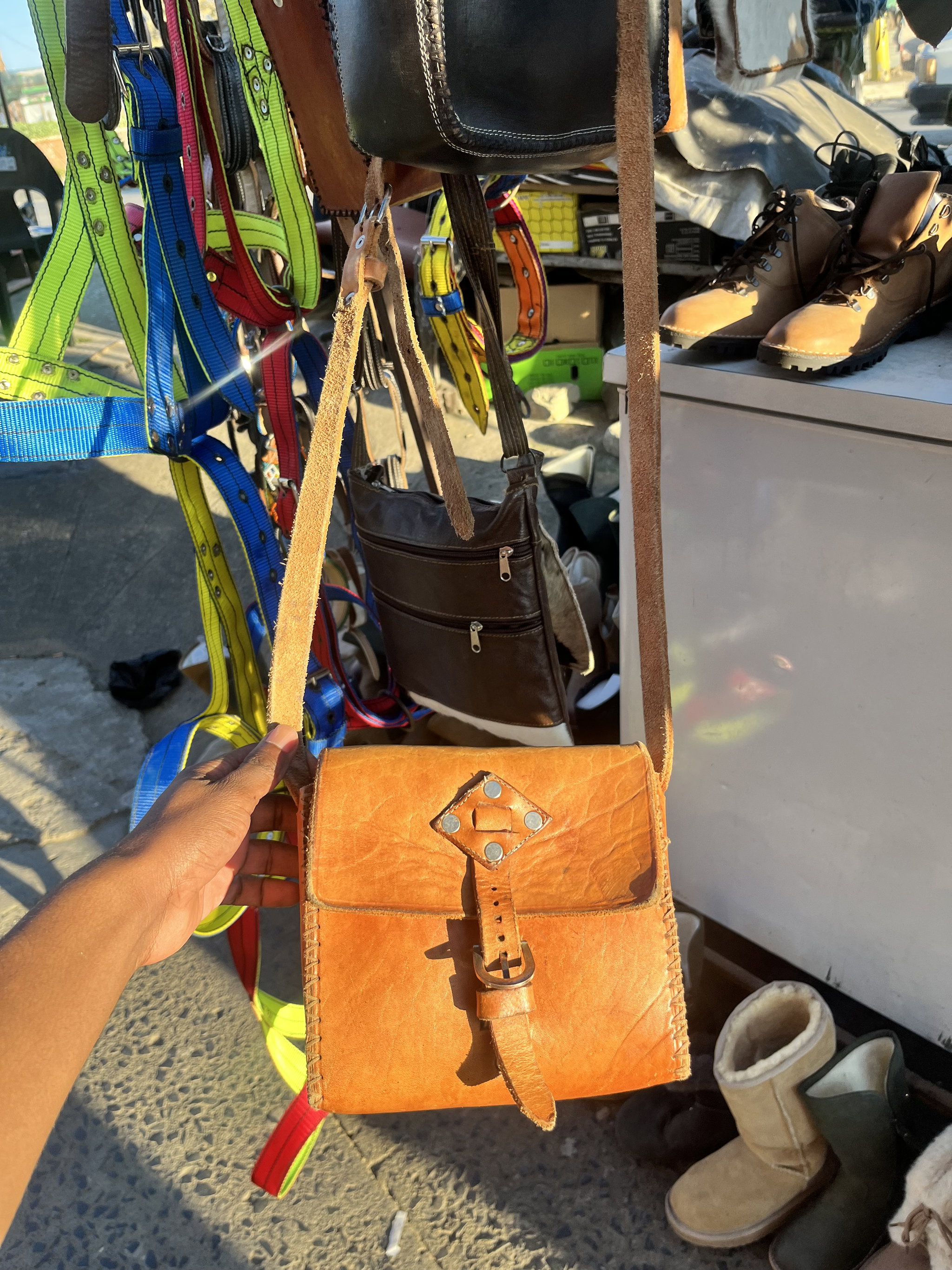 Reddish leather side bag by Ntate Mokete_1