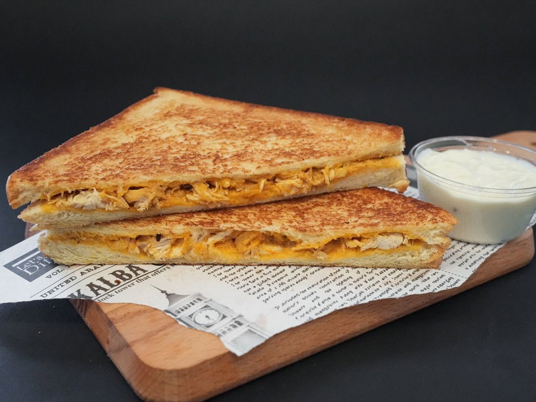 Toasted Chicken Masala With Cheese Sandwich
