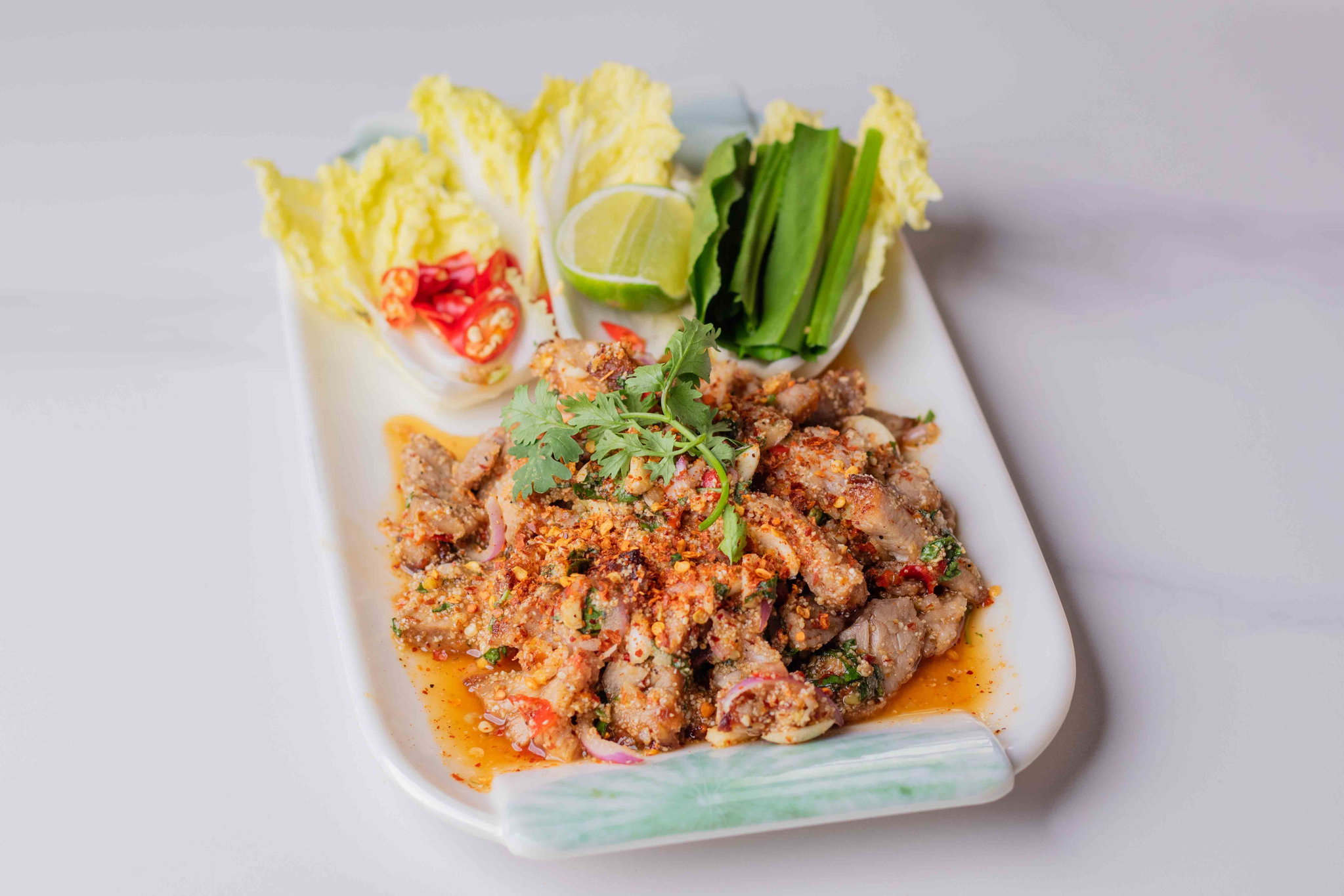 ឡាប​​សាច់​​ក​ជ្រូក​ពិ​សេស_6