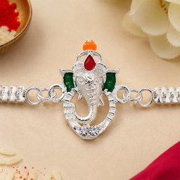 गणेश राखी – भाइयों के लिए स्टाइलिश इनेमल और सिल्वर चेन