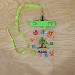 Waterproof Mobile Pouch With Neck Strap In Green, Shown Protecting A Phone
