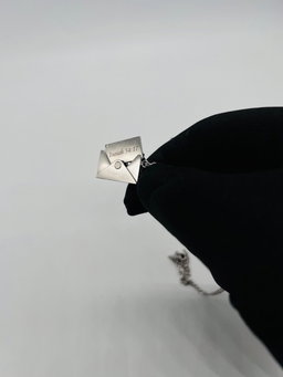 Envelope necklaces 