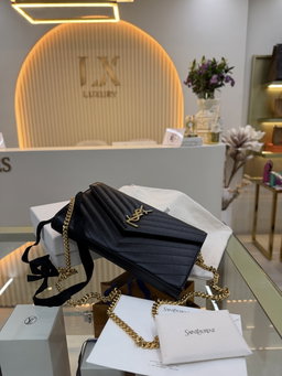 Bolsa Saint Laurent YSL preta tiracolo 