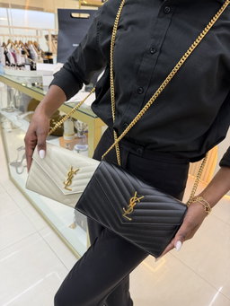 Bolsa Saint Laurent YSL preta tiracolo 