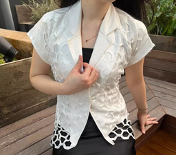 Elana Vest