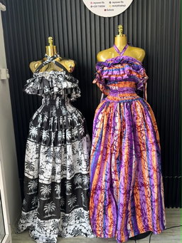 Black & White Palm Print Ruffle Gown & Purple Batik Ruffle Gown