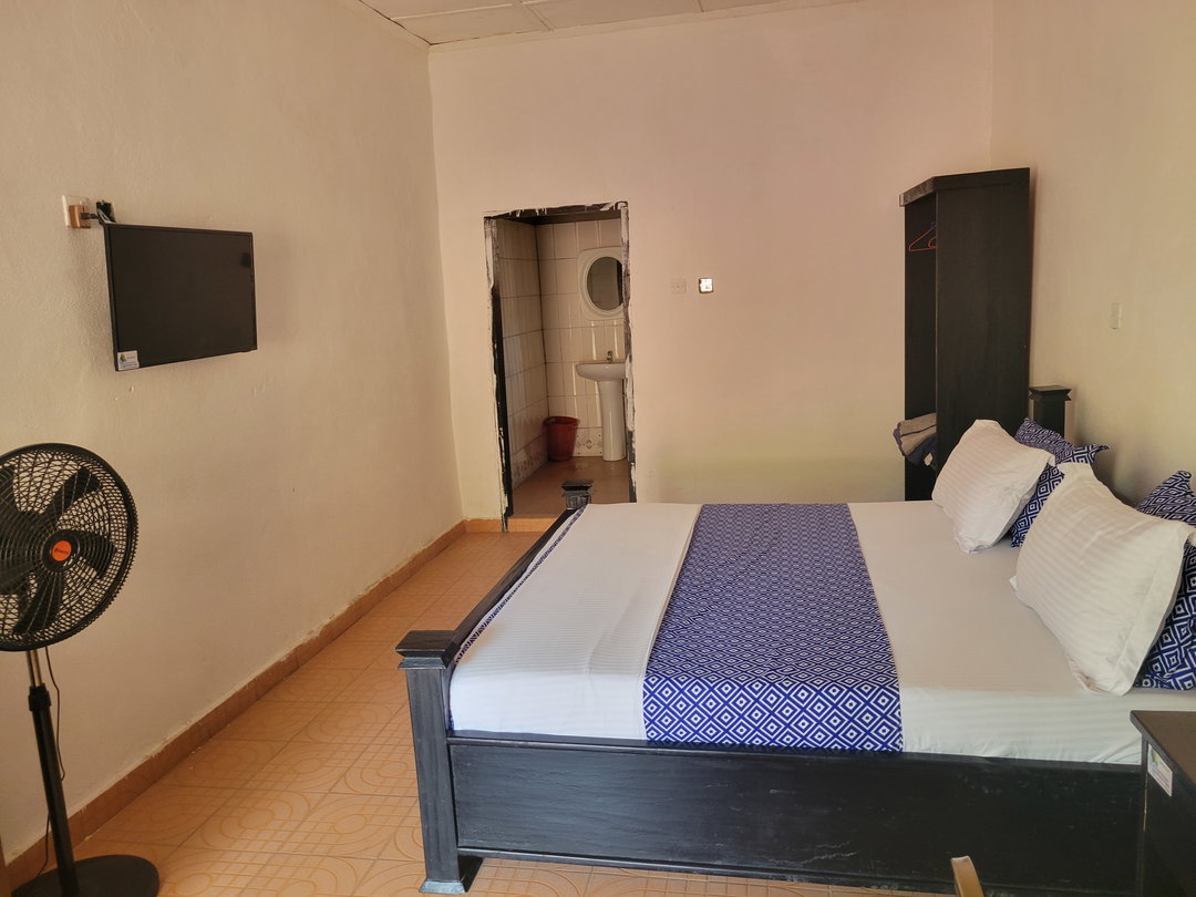Standard Room with Fan, including breakfast for two people, bedroom fridge, 32" smart TV,  & internet
