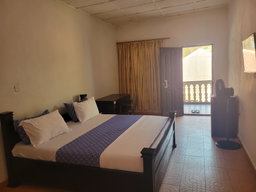 Standard Room with Fan, including breakfast for two people, bedroom fridge, 32" smart TV,  & internet