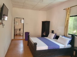 Standard Room with Fan, including breakfast for two people, bedroom fridge, 32" smart TV,  & internet