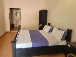 Standard Room with Fan, including breakfast for two people, bedroom fridge, 32" smart TV,  & internet