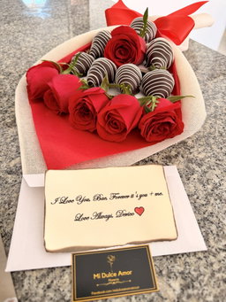 Chocolate-covered strawberries and roses 