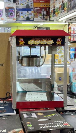 A commercial style tabletop popcorn machine