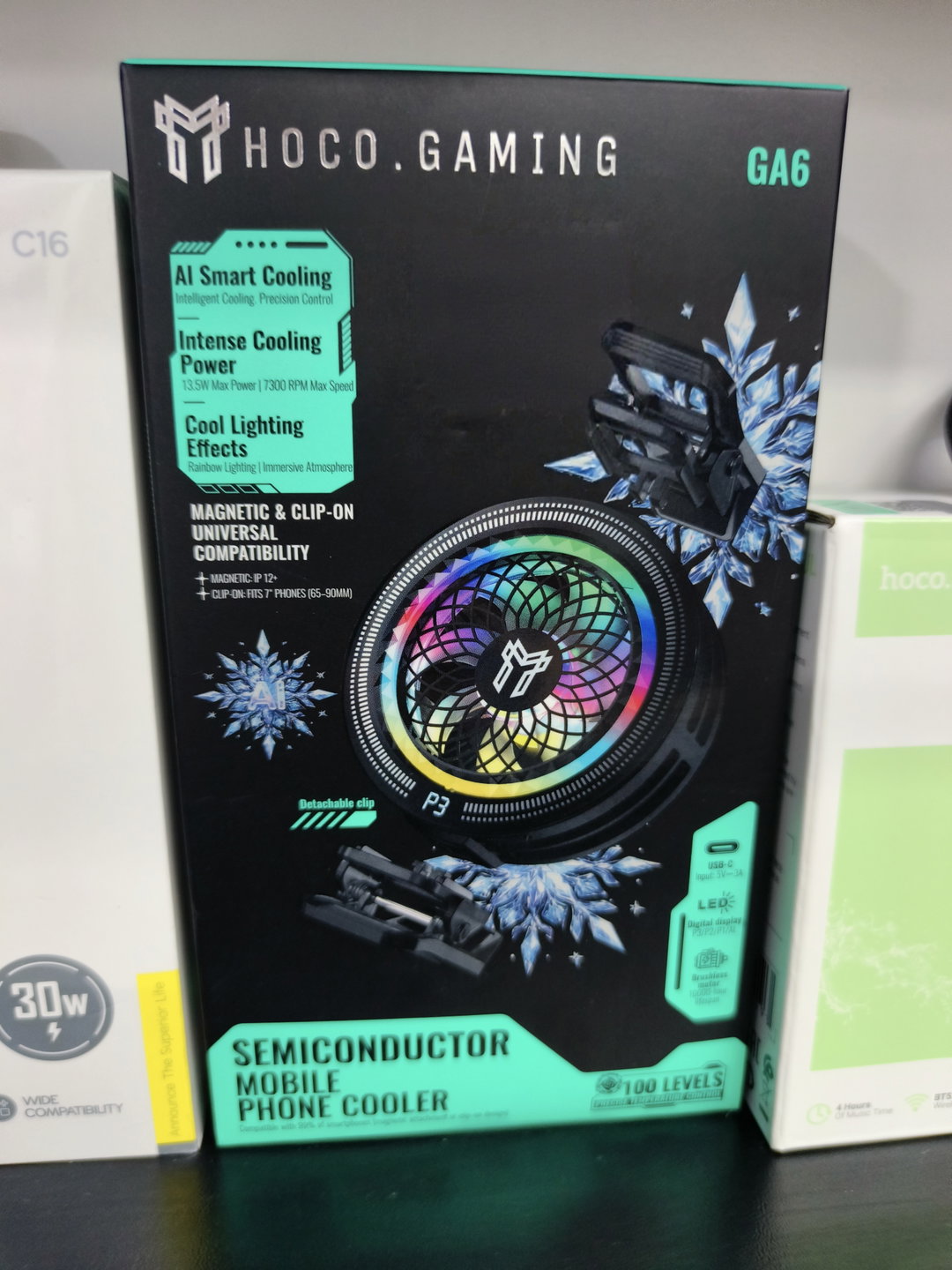 Hoco phone ice AI cooling with 3 levels with 10000rpm/hour it reduces the temperature of ur phone up to 25°c so you can say by to the fps throttling and you can play ur game with a stable fps