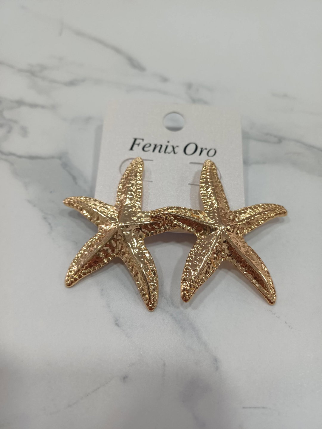 Pendientes estrella de mar . Acero