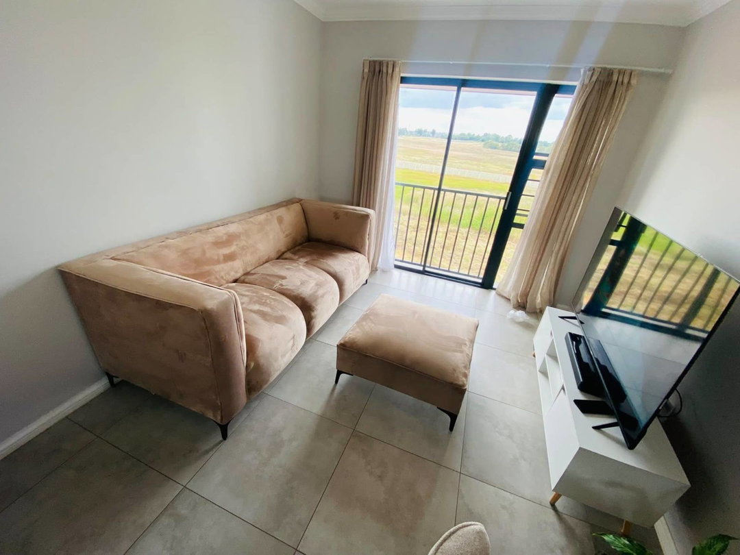 3 seater Couch and foot rest