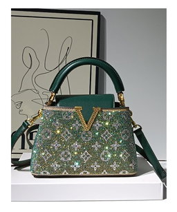Bejeweled top handle bag