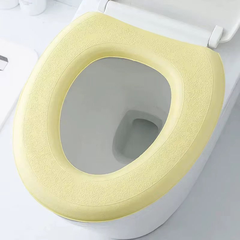 Couche pour siège de toilette