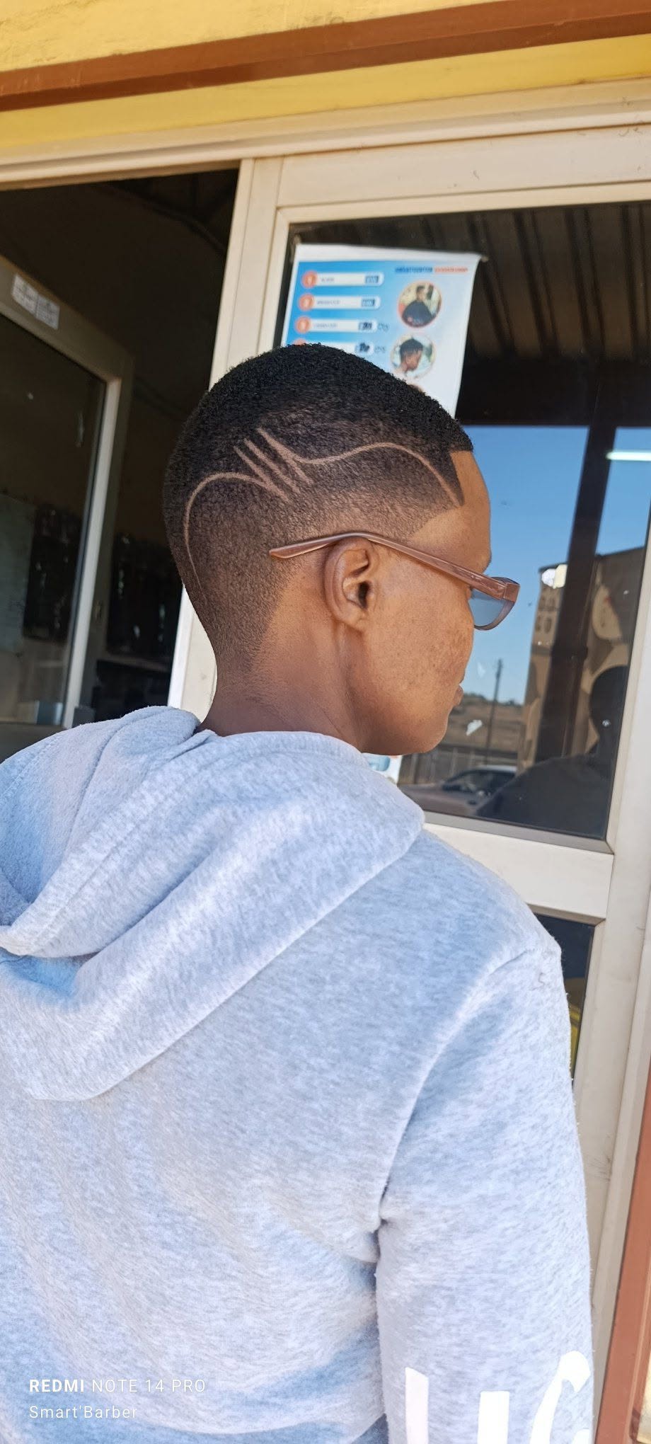 Short Taper Fade with Freestyle Razor Design Lines_4