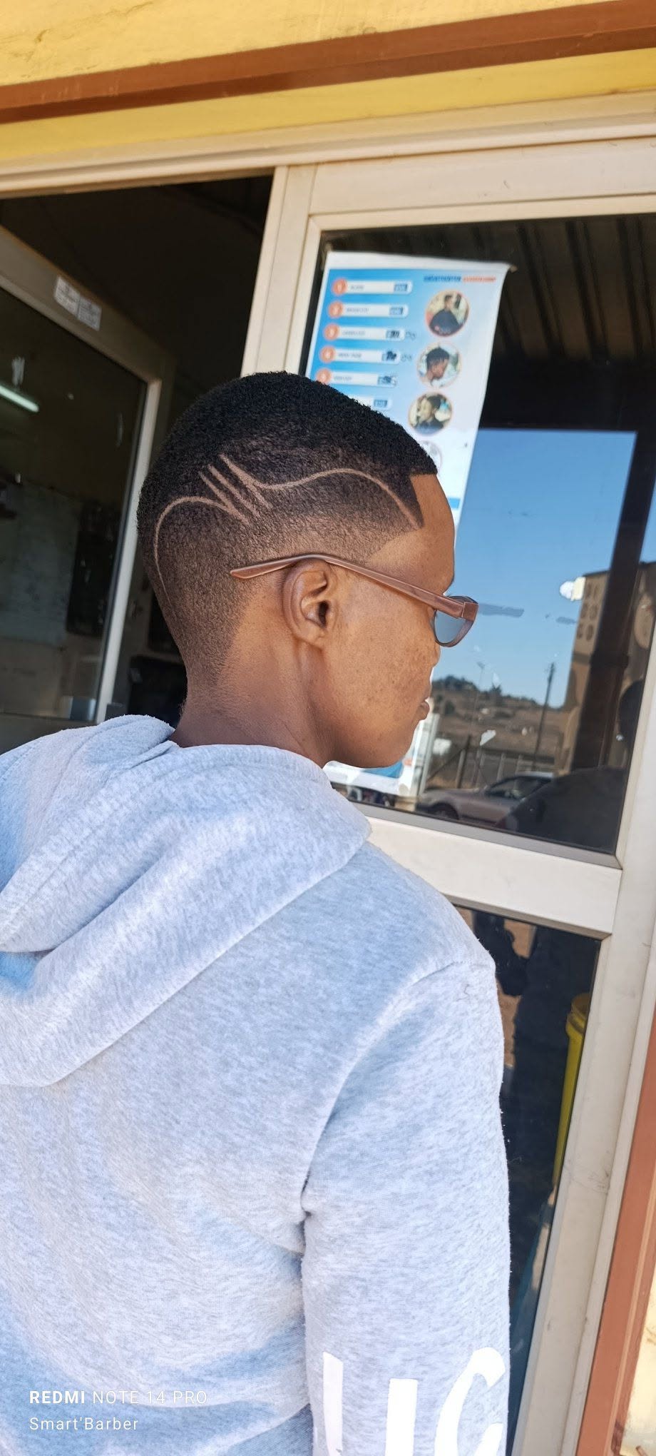 Short Taper Fade with Freestyle Razor Design Lines_2