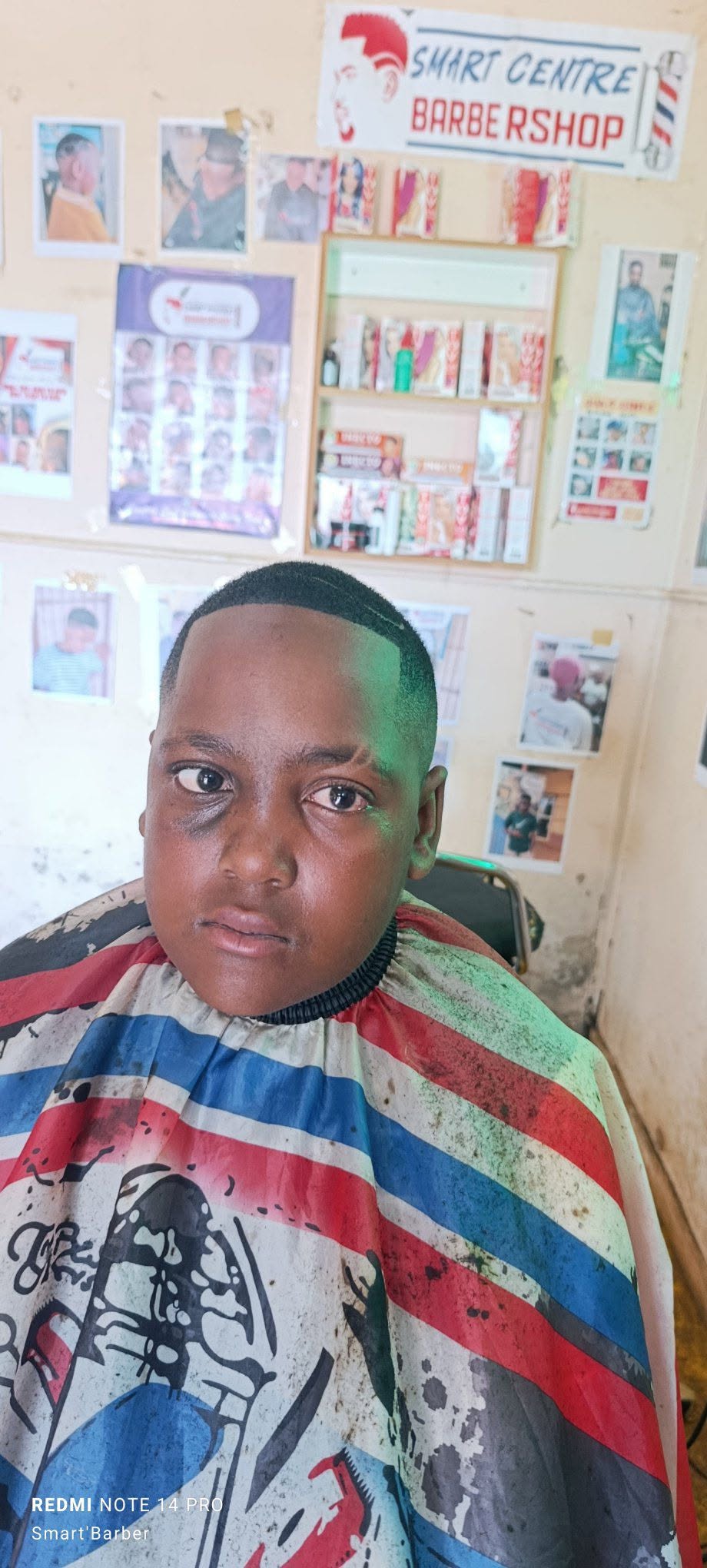 Crisp High Skin Fade with a "Smiley Face" Razor Design_1