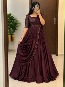 South Indian pleated gown with elegant blouse design RS