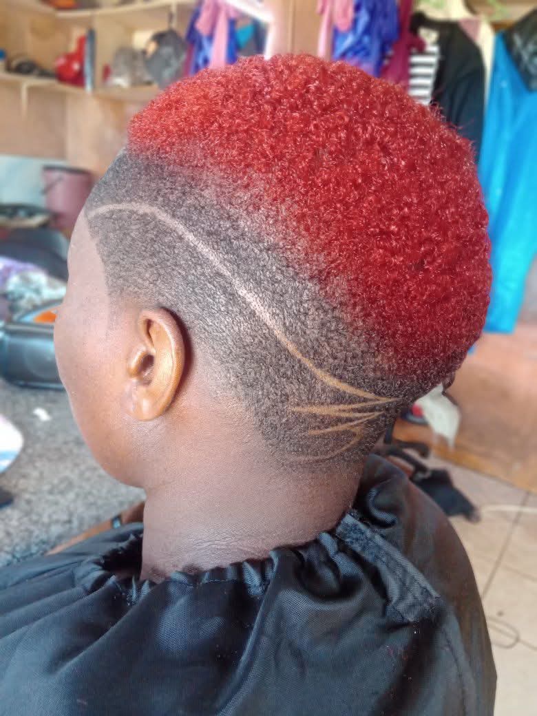 Ruby Red Short Crop with a Taper Fade and Curved Freestyle Razor Art_1