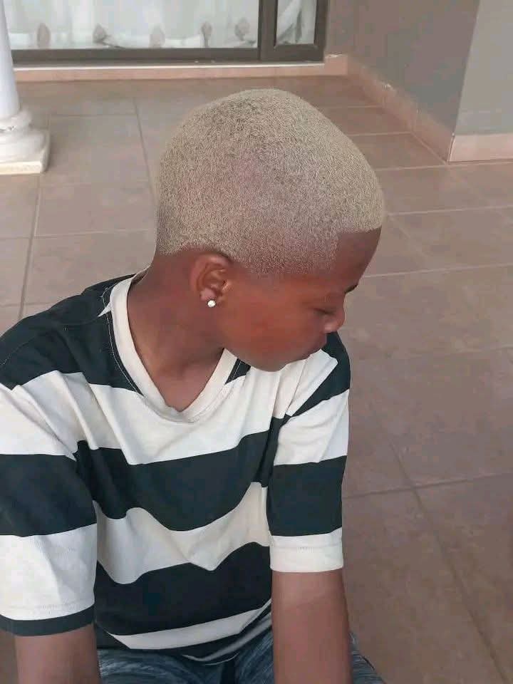 Platinum Blonde Buzz Cut with a Crisp Low Taper and Sharp Line-Up