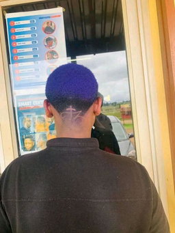Electric Purple Low Fade with a Cross & Initial Nape Design