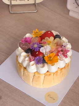 Basque Burnt Cheesecake with Mixed Fruits & Edible Flowers