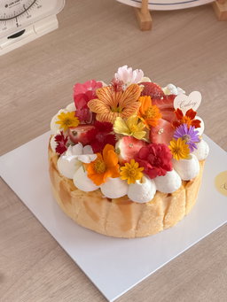 Basque Burnt Cheesecake with Mixed Fruits & Edible Flowers