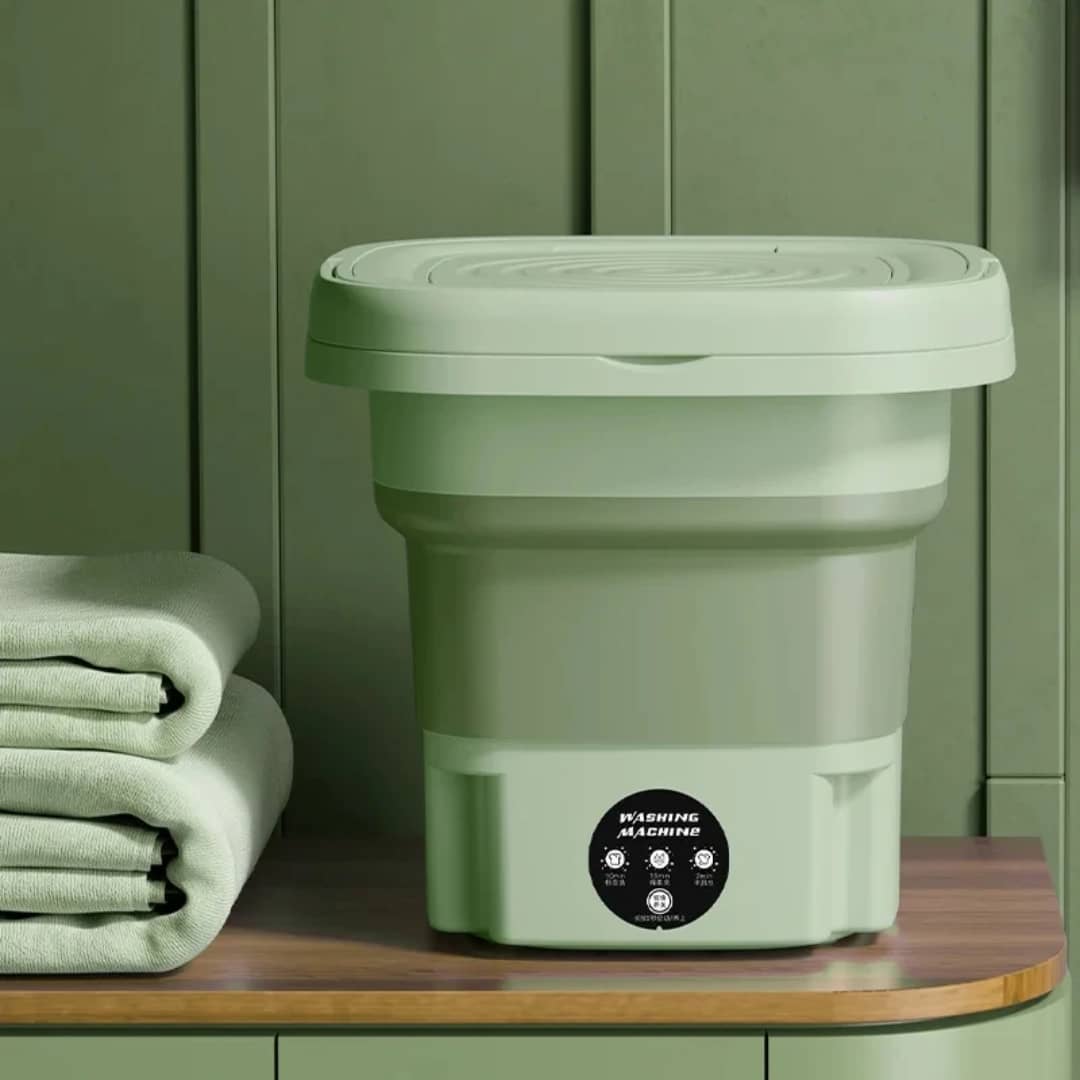 A portable, collapsible mini washing machine