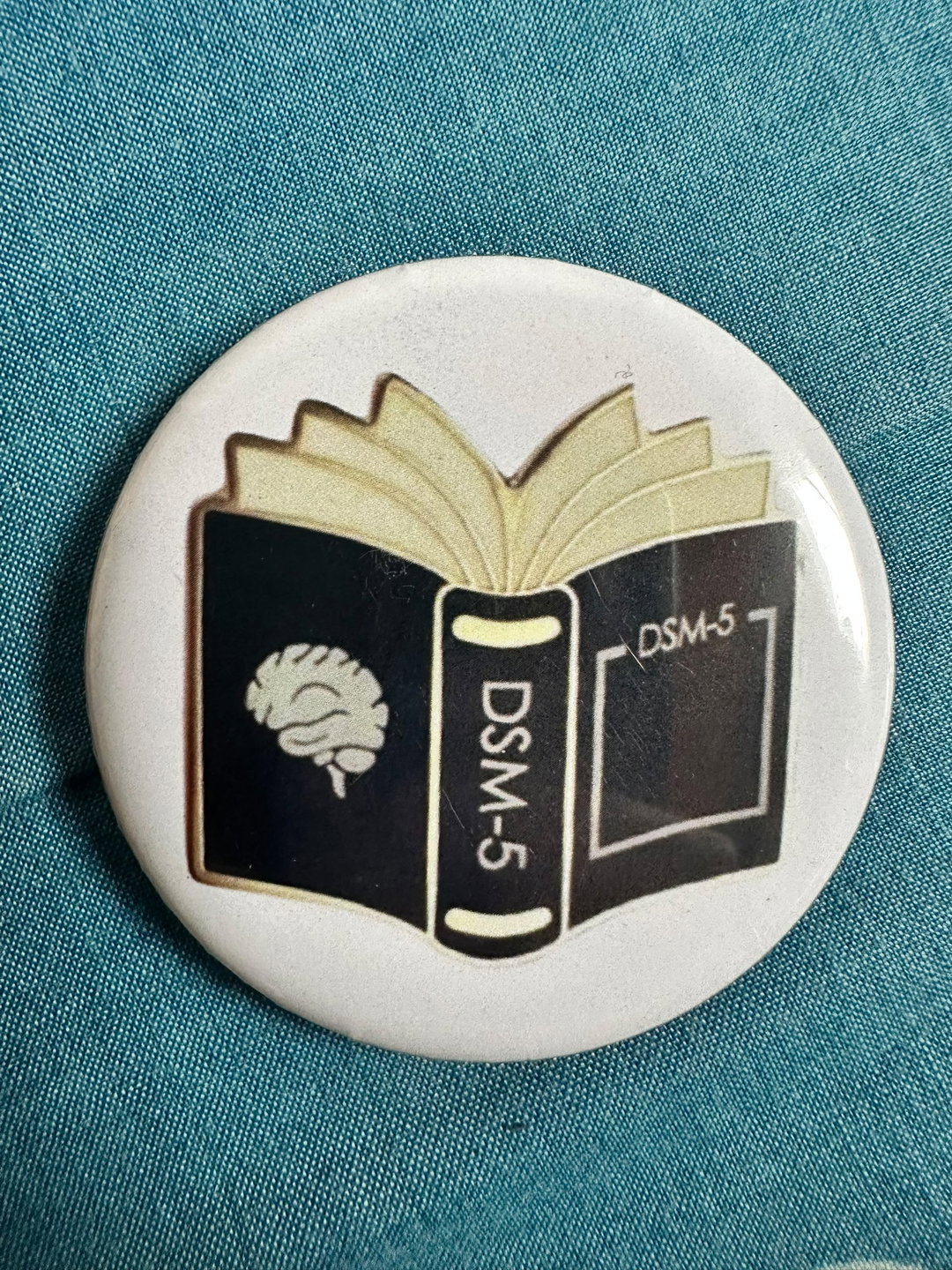 WHITE BUTTON BADGE