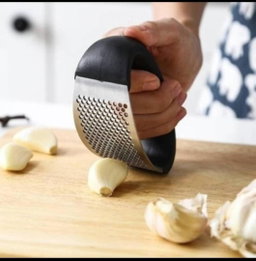 Rocker garlic press