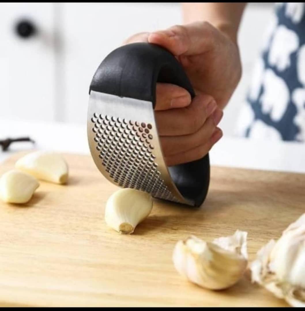 Rocker garlic press