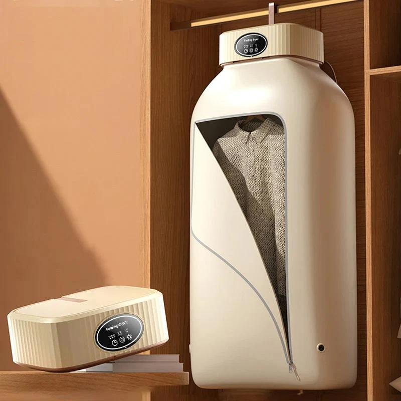 A portable, folding clothes dryer