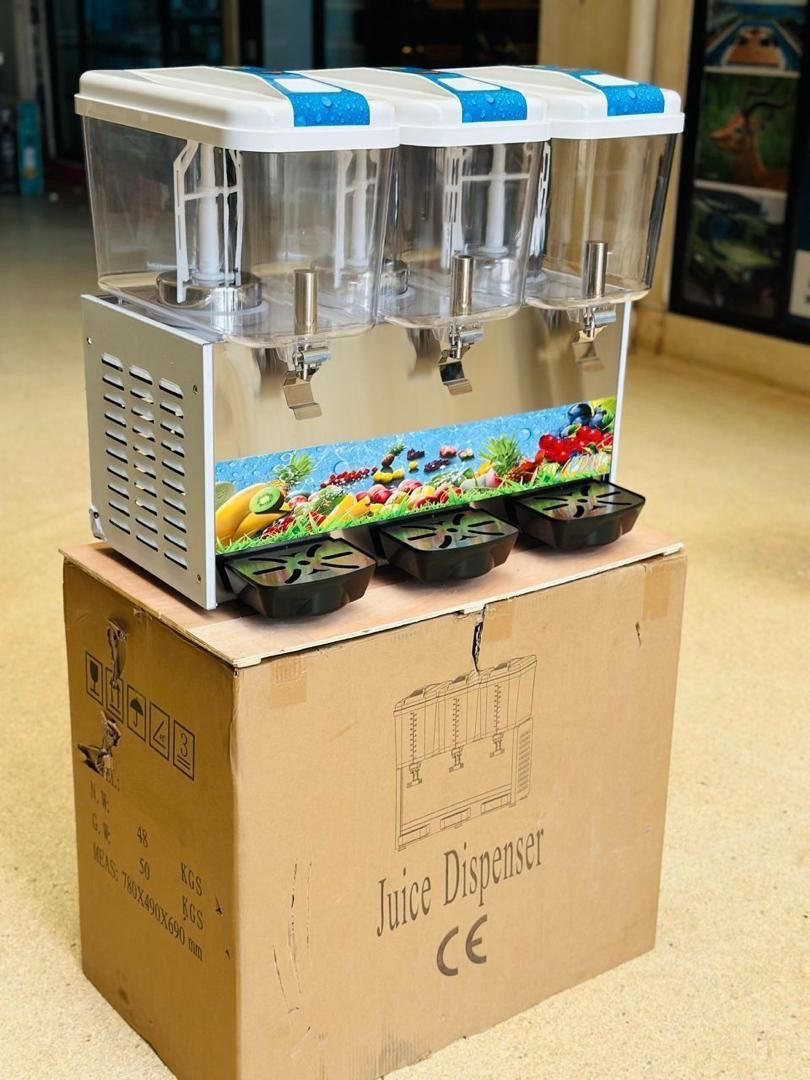 A triple-tank commercial juice dispenser, _0