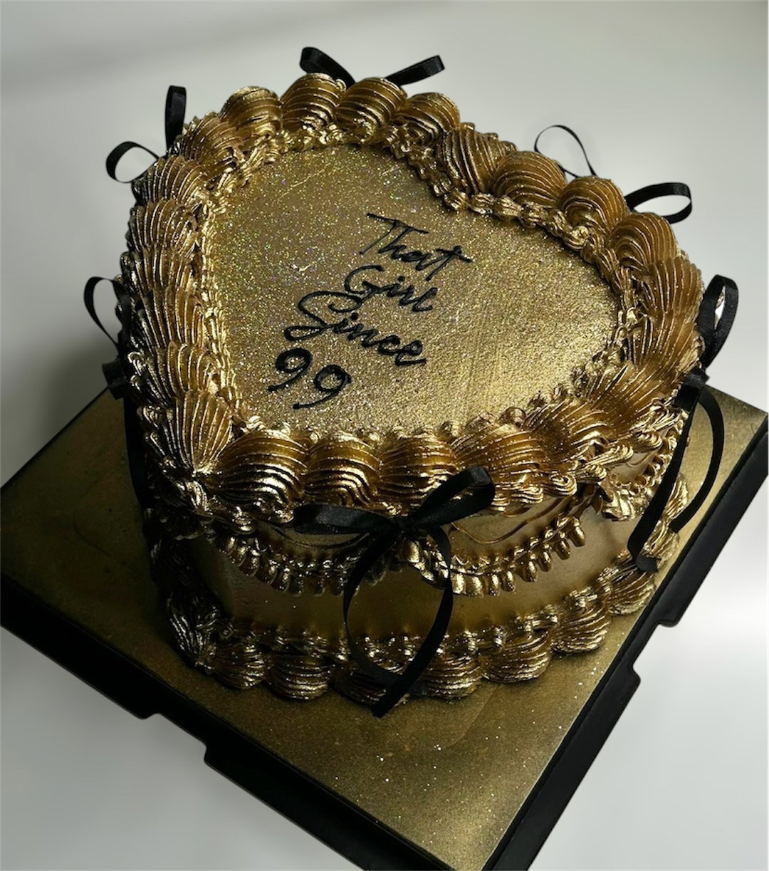 Gold Glitter Cake with black bows