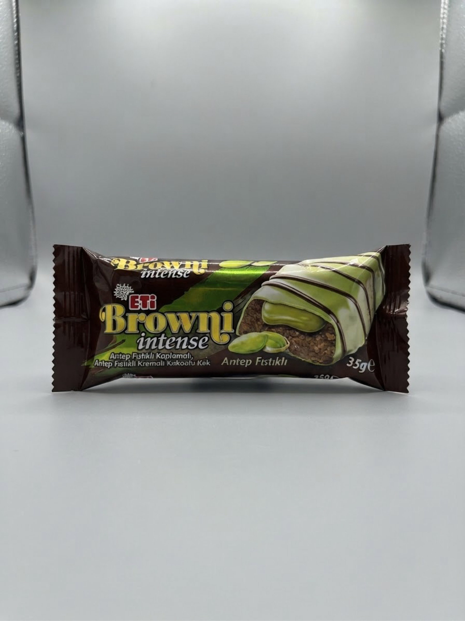 ETİ Browni Intense Antep Fıstıklı Antep Fıstıklı Kaplamalı, Antep Fıstıklı Kremalı Kakaolu Kek 35g_0