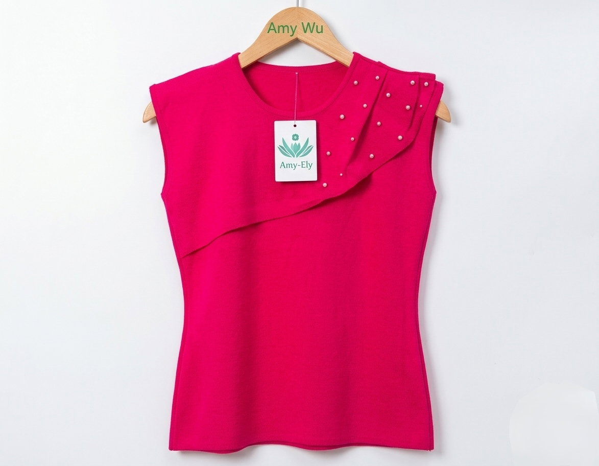 Women's black sleeveless top featuring an asymmetrical, layered design across the chest_4