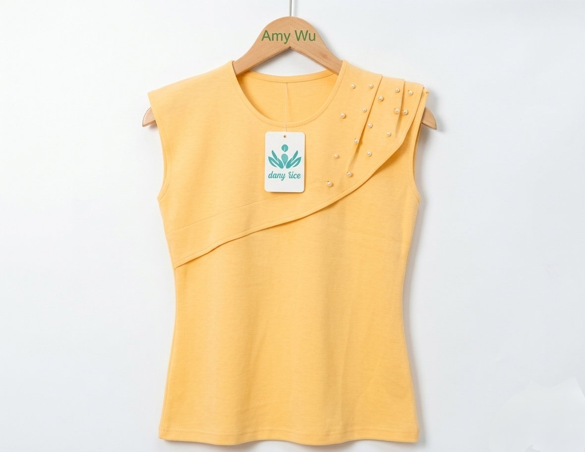 Women's black sleeveless top featuring an asymmetrical, layered design across the chest_7